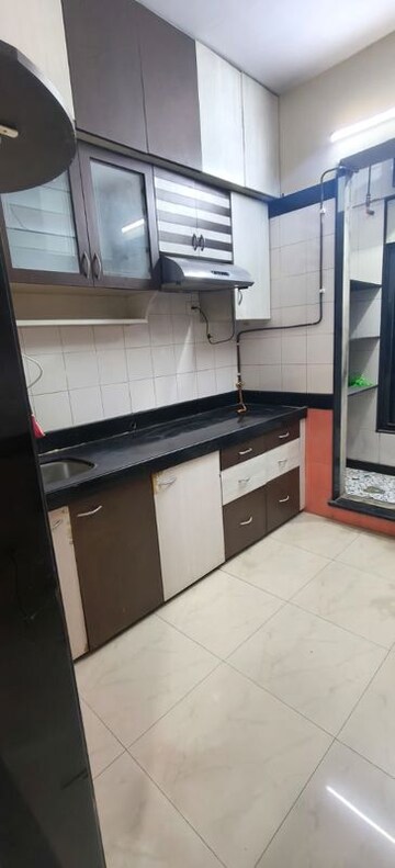 Kitchen in 2 BHK Apartment at Shreeji Plaza Nerul, Nerul Sector 23 – for Rent