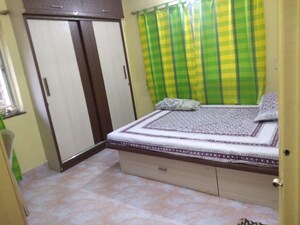 Bedroom in 2 BHK Apartment at Guru Ganesh Nagar Society, Kothrud – for Rent