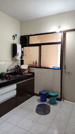 Kitchen in 2 BHK Apartment at Magarpatta Daffodils Apartment, Hadapsar – for Sale