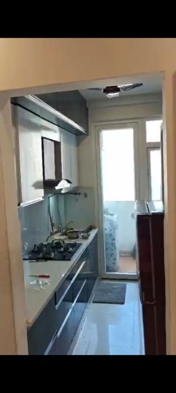 Kitchen in 2 BHK Apartment at Emenox La Solara, Sector 16 Greater Noida – for Rent