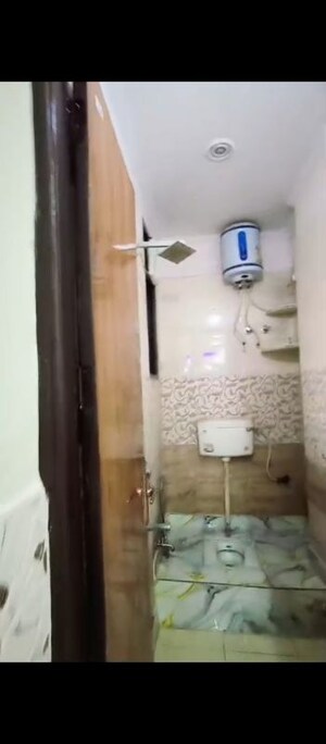 Bathroom in 2 BHK Builder Floor at Dwarka Mor – for Sale