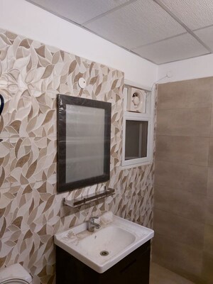 Bathroom in 3 BHK Apartment at Elite Golf Green, Sector 79 – for Sale