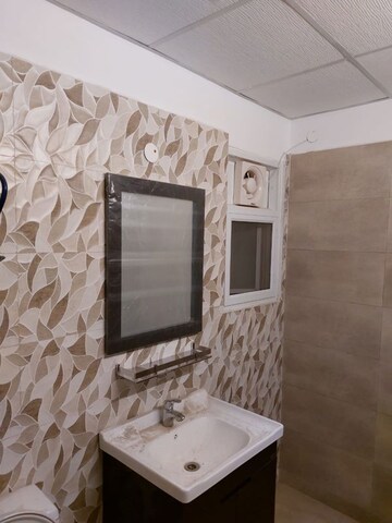 Bathroom in 3 BHK Apartment at Elite Golf Green, Sector 79 – for Sale