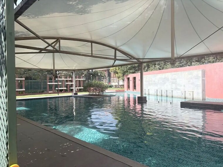 Swimming Pool, brigade-bricklane 2 Bedroom 1022 Sq.Ft. Apartment In Jakkuru Bangalore 9972552