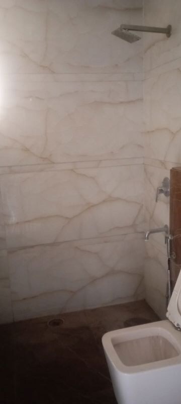 Bathroom in 5 BHK Apartment at Dhakoli – for Sale
