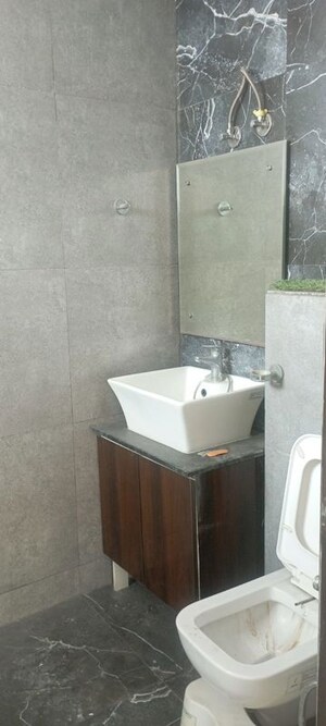 Bathroom in 5 BHK Apartment at Dhakoli – for Sale