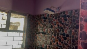 Living Room in 1 BHK Apartment at UPAVP Brahmputra Enclave, Siddharth Vihar – for Sale