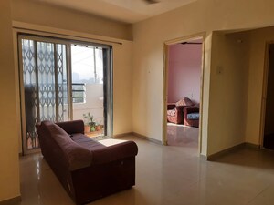 Living Room in 2 BHK Apartment at Pooja Alka Uttam Enclave, Mundhwa – for Rent