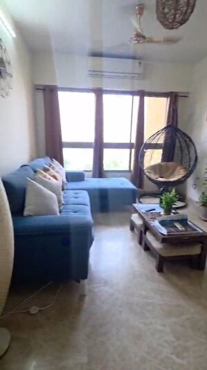 Living Room in 2 BHK Apartment at Lodha Luxuria, Majiwada – for Rent