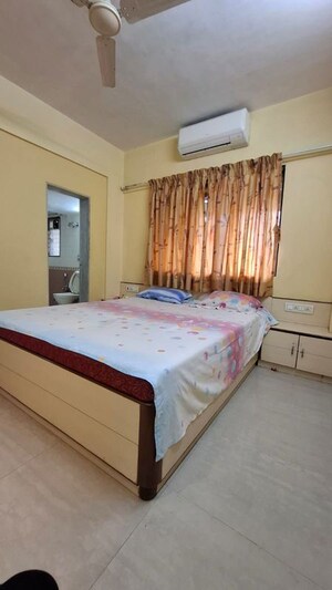 Bedroom in 2 BHK Apartment at Om Shanti CHS Powai, Powai – for Rent