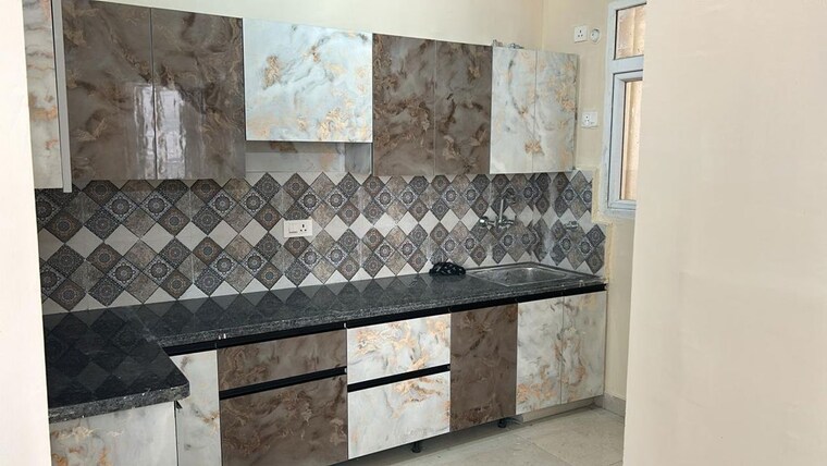 Kitchen, signature-the-millennia-3 2 Bedroom 687 Sq.Ft. Apartment In Sector 37d Gurgaon 9743055