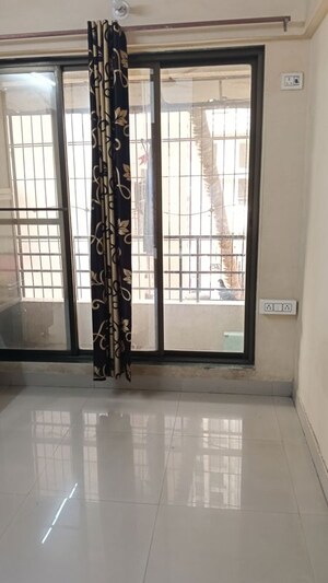 Room in 2 BHK Apartment at Pragati Sankul CHS, Dombivli West – for Rent