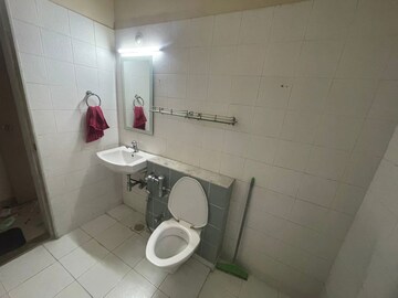 Bathroom in 2 BHK Apartment at Ambience Empyrean, Ghorpadi – for Sale