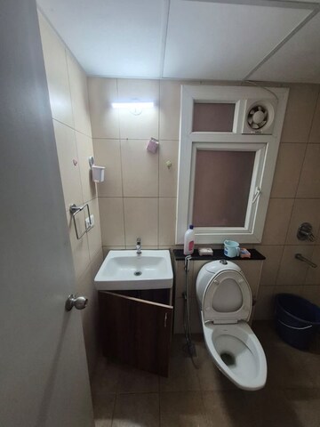 Bathroom in 2 BHK Apartment at Brigade Bricklane, Jakkuru – for Rent