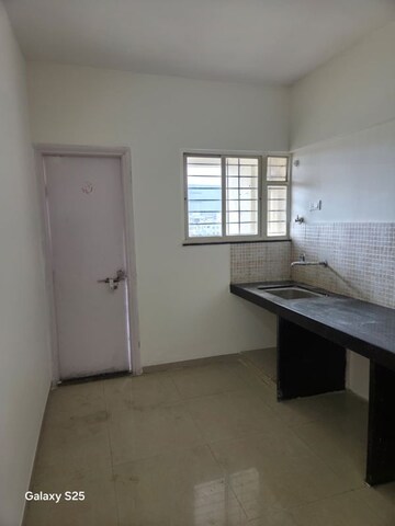 Room in 2 BHK Apartment at Raichandani Aura, Kharadi – for Rent