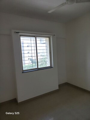 Room in 2 BHK Apartment at Raichandani Aura, Kharadi – for Rent