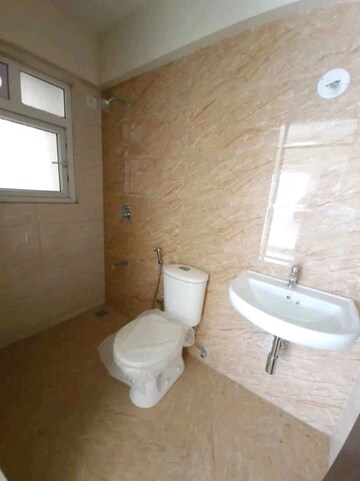 Bathroom in 1 BHK Apartment at Dharti Orange Heights, Morya Nagar – for Sale