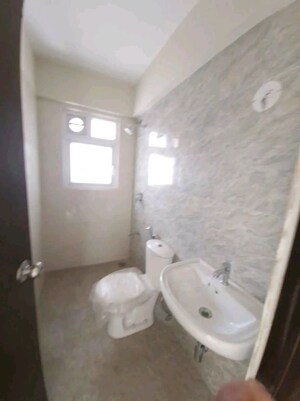 Bathroom in 1 BHK Apartment at Dharti Orange Heights, Morya Nagar – for Sale