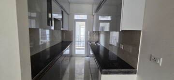 Kitchen in 3.5 BHK Independent House at Smart World Gems, Sector 89 – for Sale