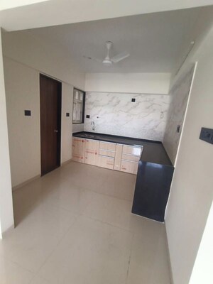 Kitchen in 2 BHK Apartment at Krishna Amorapolis, Dhanori – for Rent