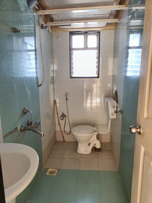 Bathroom in 2 BHK Apartment at Varanasi Society, Warje – for Rent