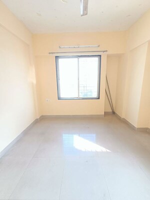 Master Bedroom in 2 BHK Apartment at Varanasi Society, Warje – for Rent