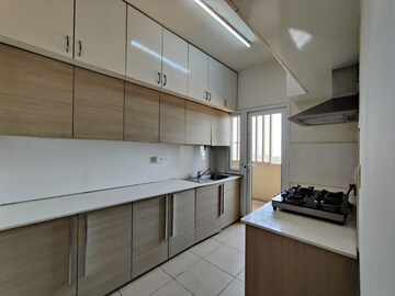 Kitchen in  Apartment at Bhartiya Nikoo Homes Phase 2, Thanisandra Main Road – for Rent