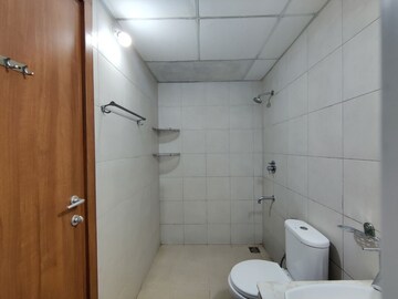 Bathroom in  Apartment at Bhartiya Nikoo Homes Phase 2, Thanisandra Main Road – for Rent