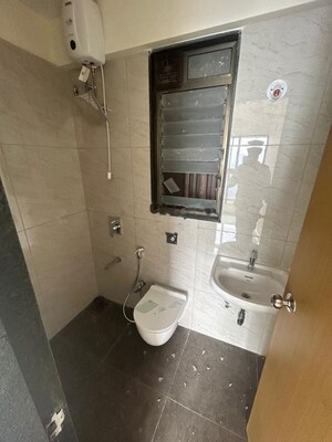 Bathroom in 2 BHK Apartment at Chandak 34 Park Estate, Goregaon West – for Rent