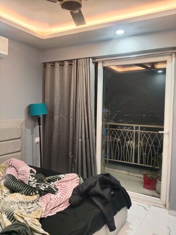 Living Room in 2 BHK Apartment at Mahagun Mywoods III, Sector 16c Greater Noida – for Rent