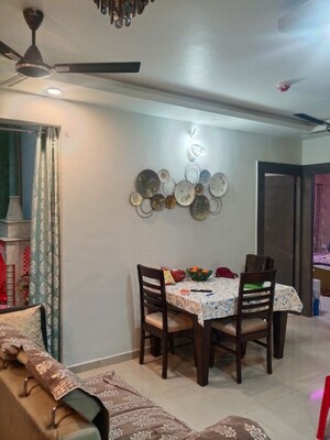 Living Room in 2 BHK Apartment at Mahagun Mywoods III, Sector 16c Greater Noida – for Rent