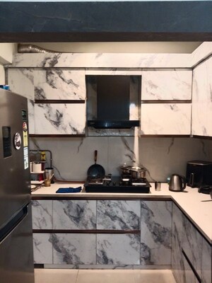 Kitchen in 2 BHK Apartment at Mahagun Mywoods III, Sector 16c Greater Noida – for Rent