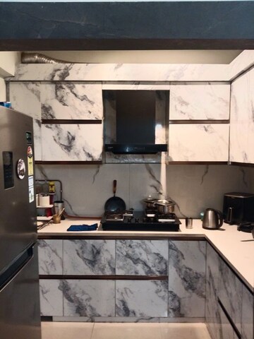 Kitchen in 2 BHK Apartment at Mahagun Mywoods III, Sector 16c Greater Noida – for Rent