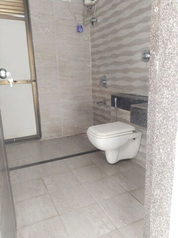 Bathroom in 3 BHK Apartment at Trishul Symphony, Kharghar – for Rent