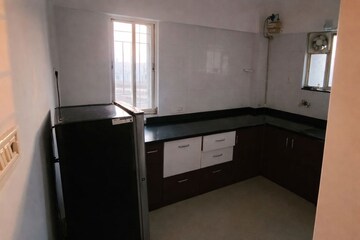 Kitchen in 1 BHK Apartment at Suyog Nisarg, Wagholi – for Sale