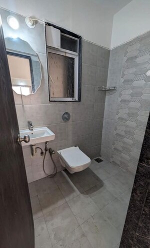 Bathroom in 2 BHK Apartment at Aashna Samadhan, Goregaon West – for Rent