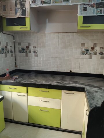 Kitchen in 1 BHK Apartment at Nagari Niwara CHS, Goregaon East – for Rent