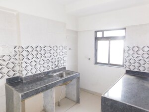 Kitchen in 1 BHK Apartment at Shreedham Splendour, Andheri West – for Sale
