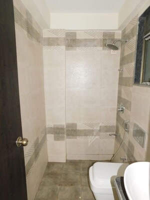 Bathroom in 1 BHK Apartment at Shreedham Splendour, Andheri West – for Sale