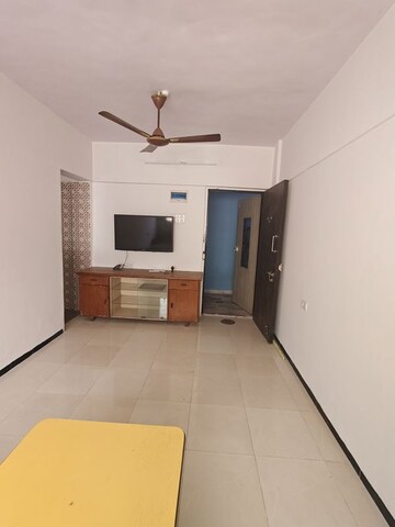 Living Room in 1 BHK Apartment at Golden Palace CHS, Kandivali East – for Rent