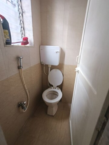 Bathroom in 1 BHK Apartment at Golden Palace CHS, Kandivali East – for Rent