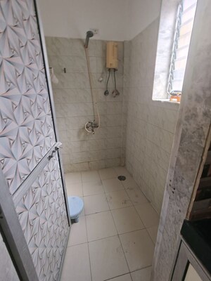 Bathroom in 1 BHK Apartment at Golden Palace CHS, Kandivali East – for Rent