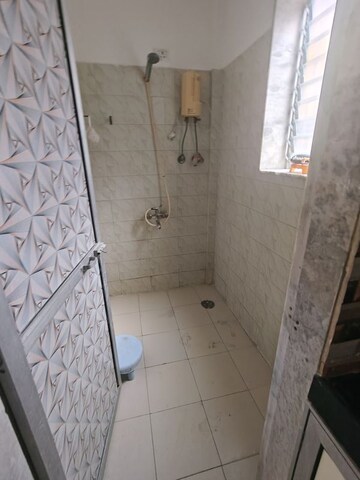 Bathroom in 1 BHK Apartment at Golden Palace CHS, Kandivali East – for Rent