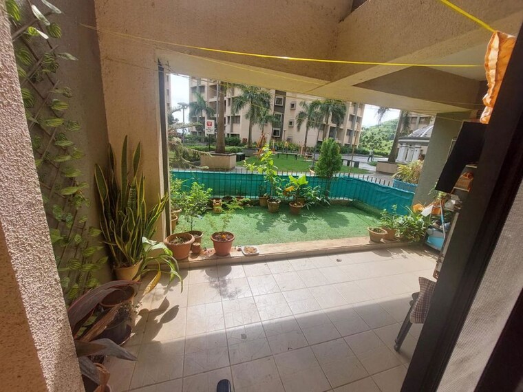 Balcony, pride-world-city-long-island 2 Bedroom 1059 Sq.Ft. Apartment In Charholi Budruk Pune 9976810