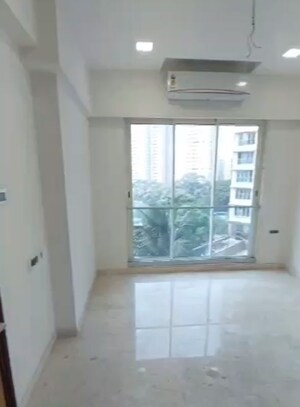Room in 2 BHK Apartment at Ekta Tripolis, Goregaon West – for Sale
