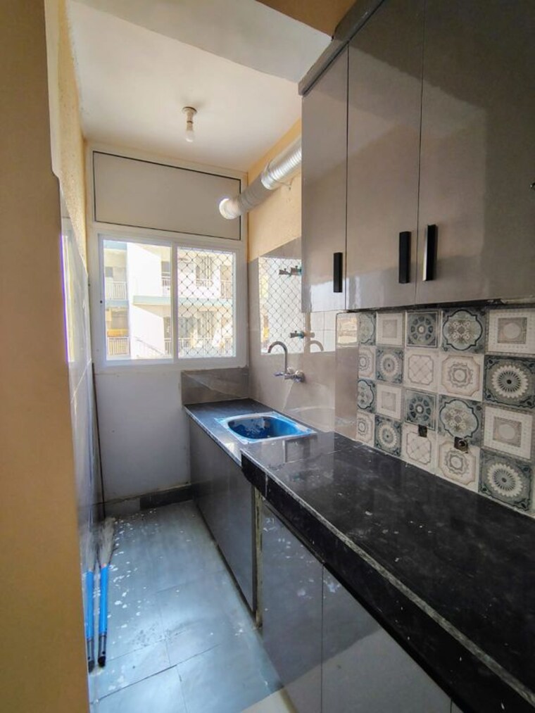 Kitchen, adore-happy-homes-exclusive 3 Bedroom 645 Sq.Ft. Apartment In Sector 86 Faridabad 9977147