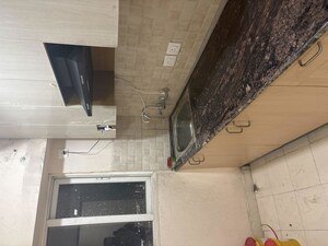 Kitchen in 2 BHK Apartment at Amrapali Dream Valley – for Rent