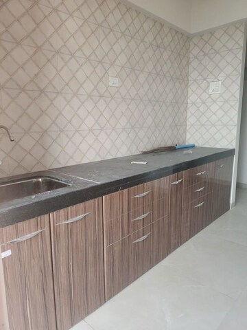 Kitchen in 2 BHK Apartment at Wellwisher Kiarah Terrazo, Hadapsar – for Sale