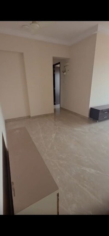 Living Room in 2 BHK Apartment at Crescent Heritage, Khar West – for Rent