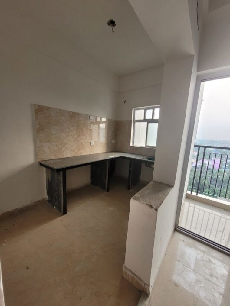 Kitchen, the-banyan-tree-garden 2 Bedroom 870 Sq.Ft. Apartment In Rajarhat New Town Kolkata 9977444